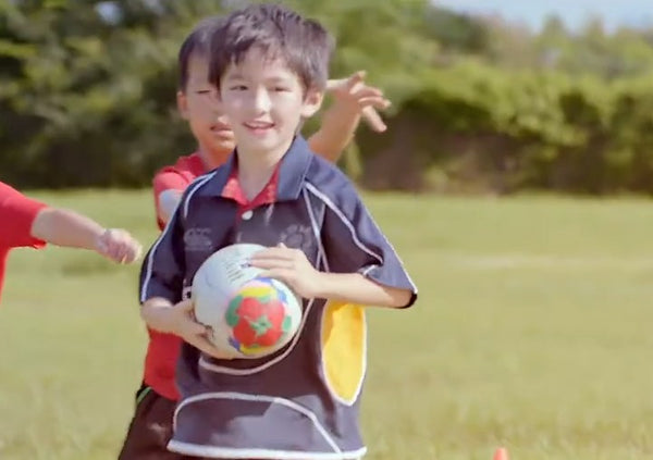 Children playing football, from our children's series TV ad
